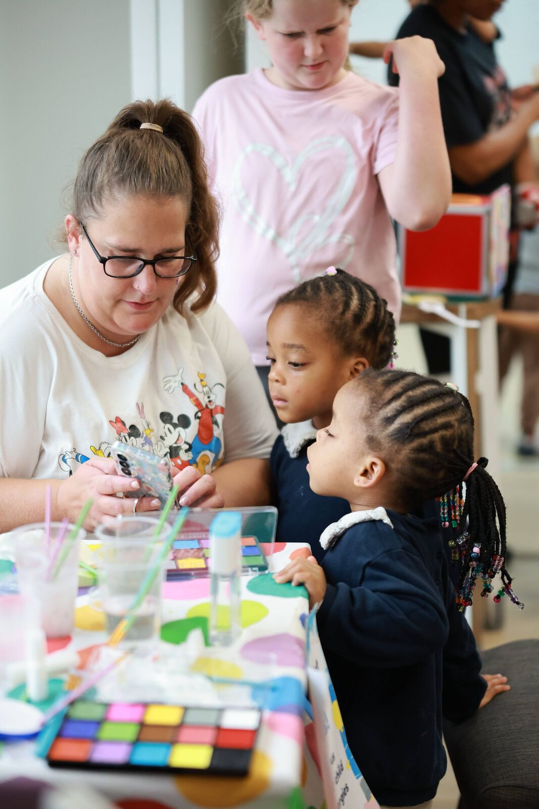 A children's leader with a child