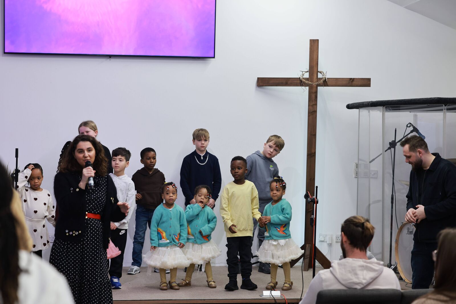 Children singing at the front on a Sunday