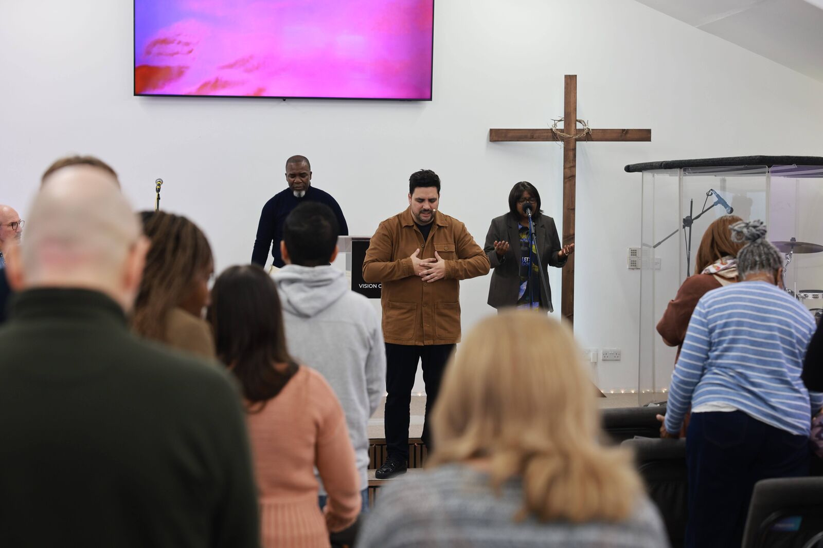 Praying together at the front